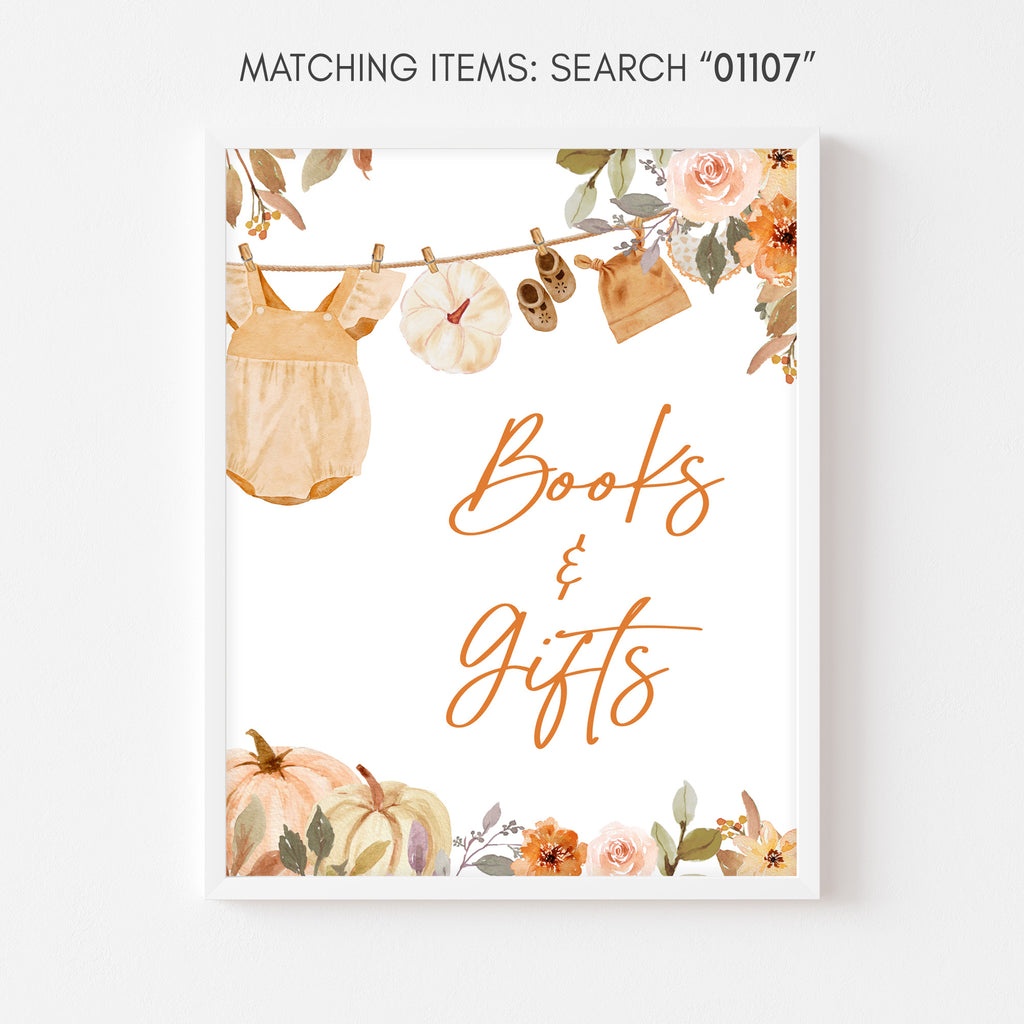 Books and gifts sign for little pumpkin baby shower featuring fall florals and cute baby clothes on a clothesline