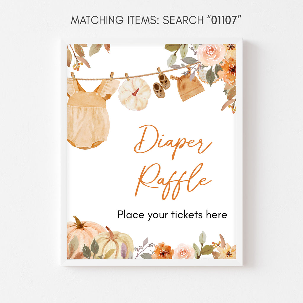 Fall diaper raffle sign with pumpkins, autumn leaves, and baby clothesline for a rustic baby shower theme