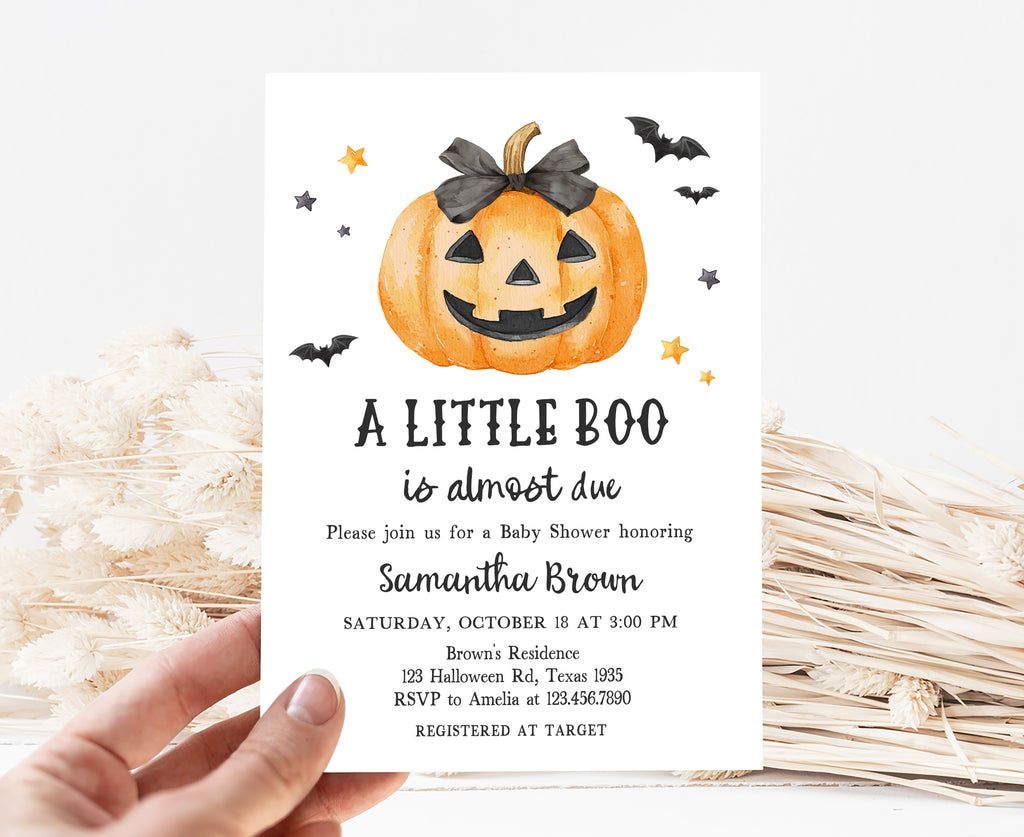 Spooky cute Halloween baby shower card with jack-o'-lantern design