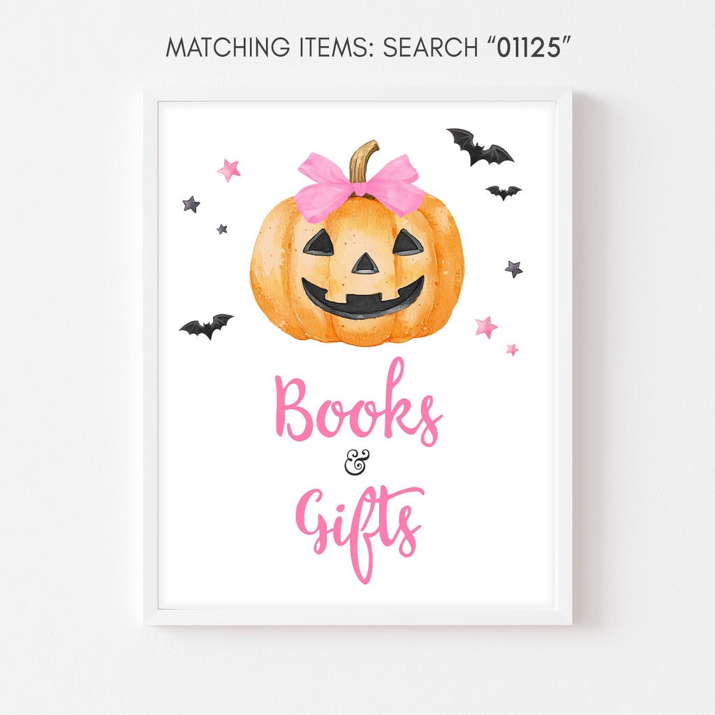 Halloween baby shower books and gifts sign with pink pumpkin design for baby girl celebration tables