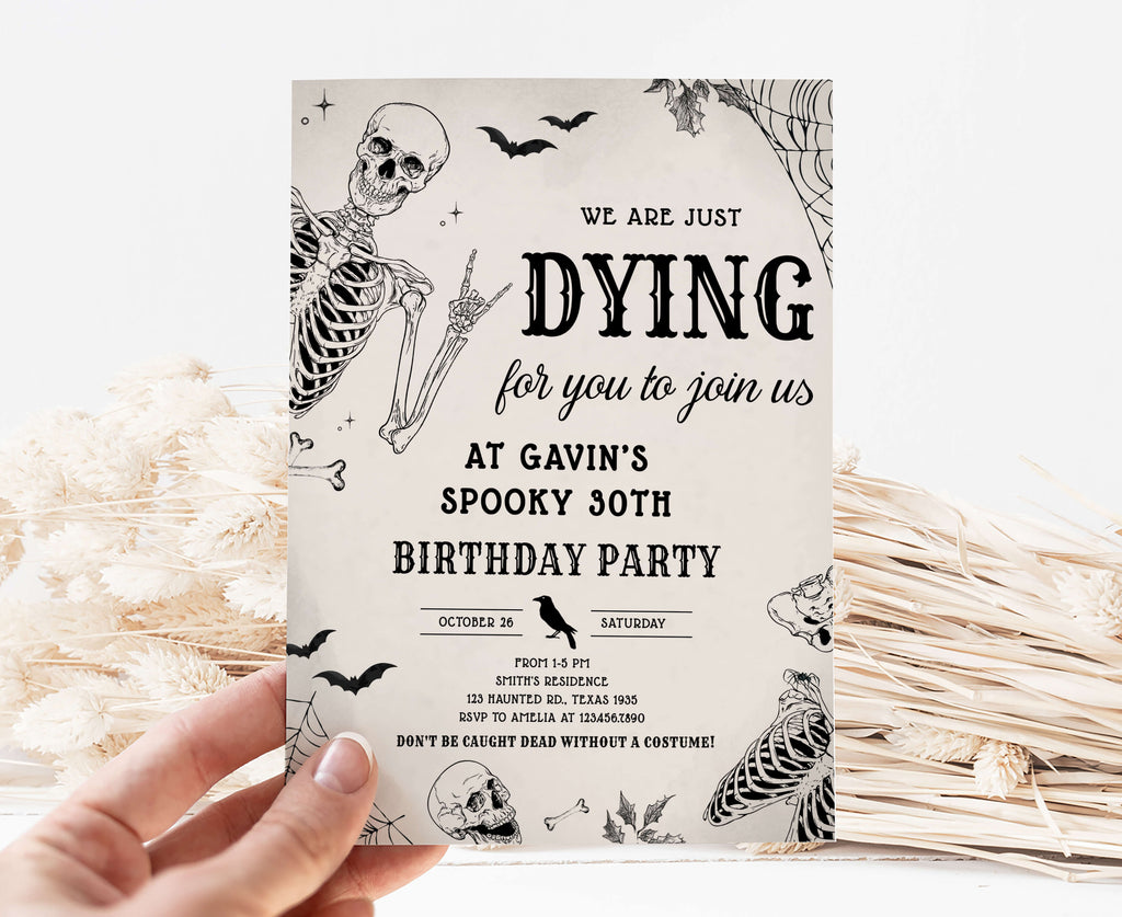 Elegant black and white Halloween birthday invitation with skeletons and bats