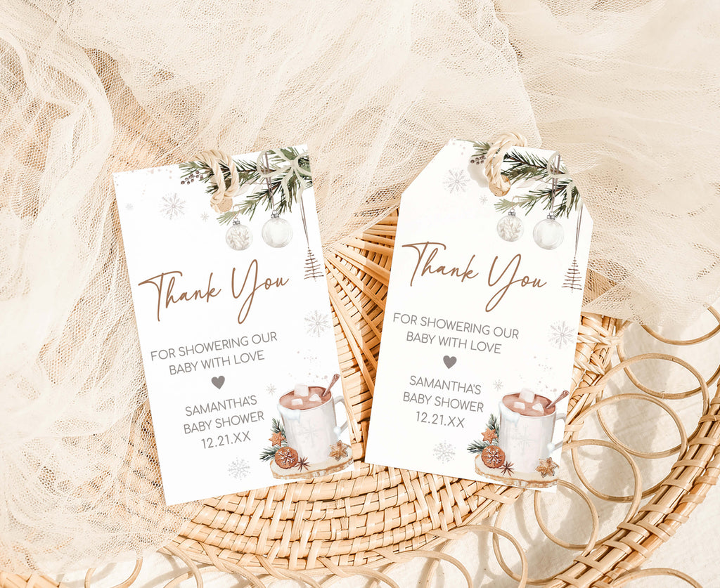 Rustic holiday baby shower favor tags with Christmas greenery and cozy hot cocoa theme