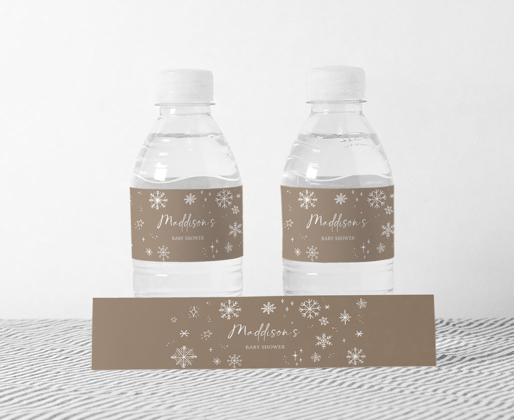 Neutral winter baby shower bottle labels with snowflakes, perfect for “Baby It’s Cold Outside” theme