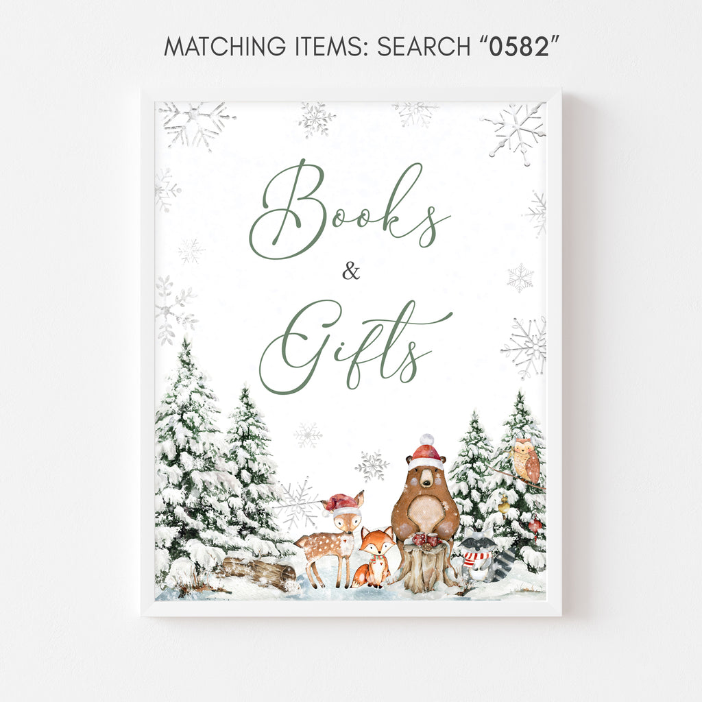 Rustic woodland Christmas baby shower books and gifts sign with winter forest theme