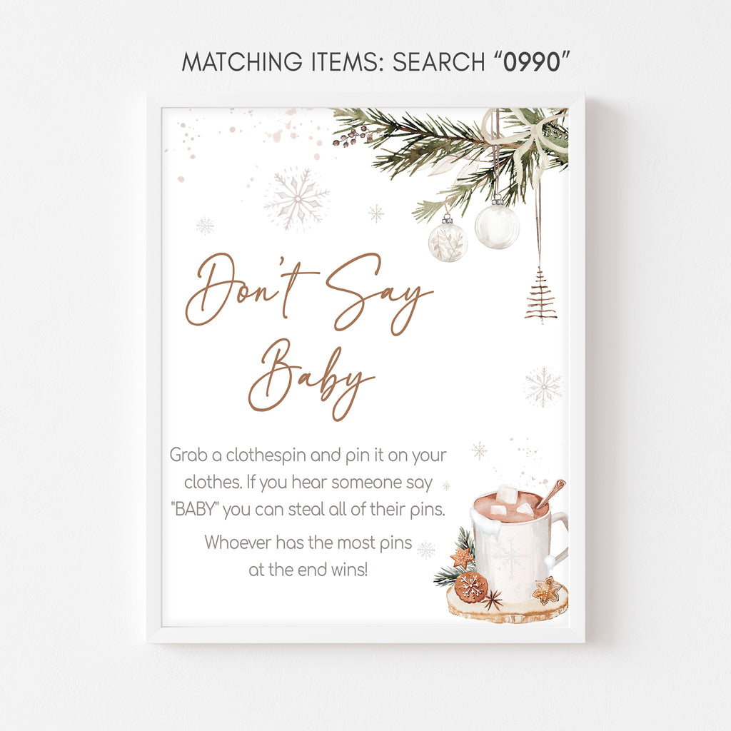 Holiday baby shower don’t say baby game sign with winter greenery theme