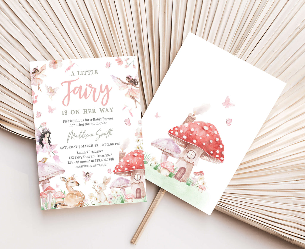 Fairy-themed baby shower invitations on a decorative background