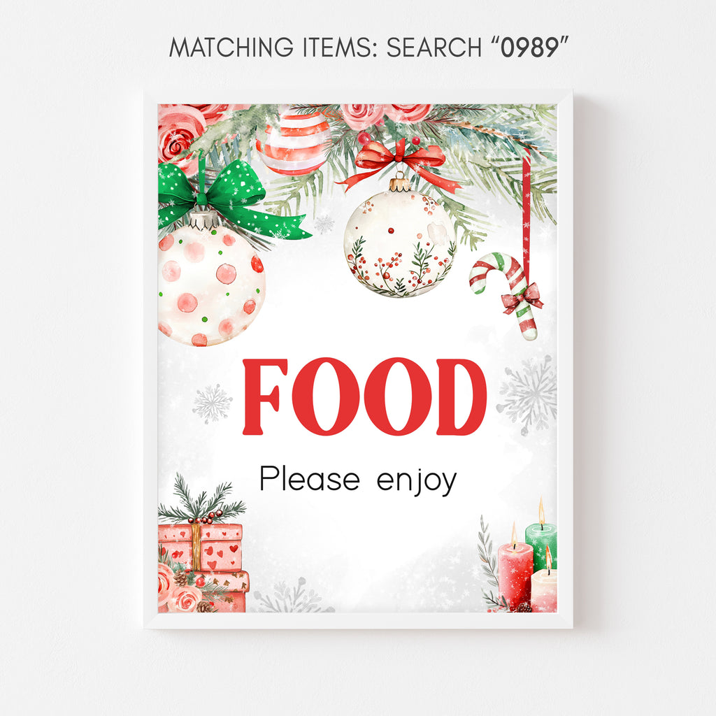 Holiday baby shower food sign with Christmas ornaments, bows, and festive red and green decor