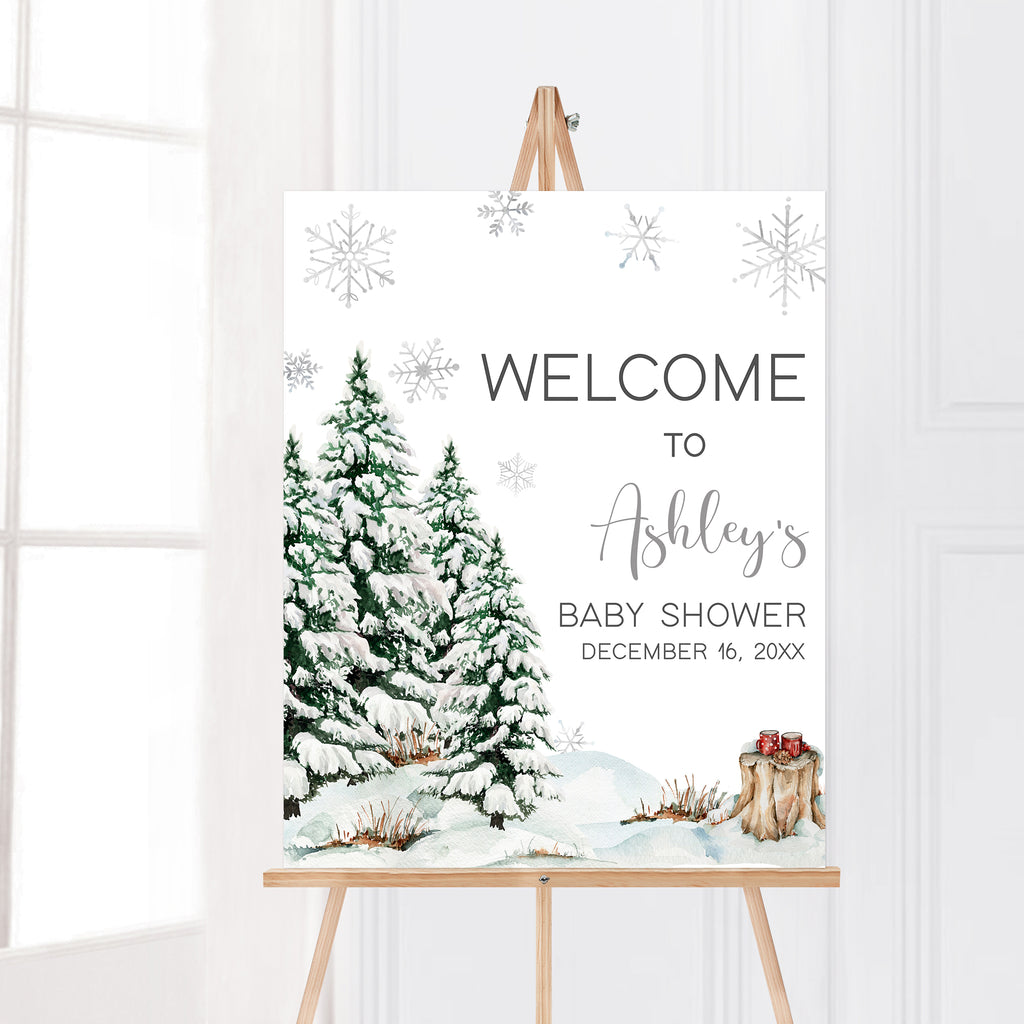 Winter baby shower welcome sign with snowy pine forest and silver snowflakes, gender neutral