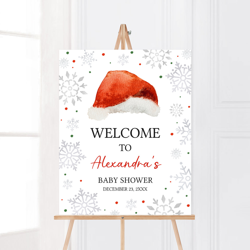 Christmas baby shower welcome sign with Santa hat and snowflakes, festive gender neutral holiday party decoration