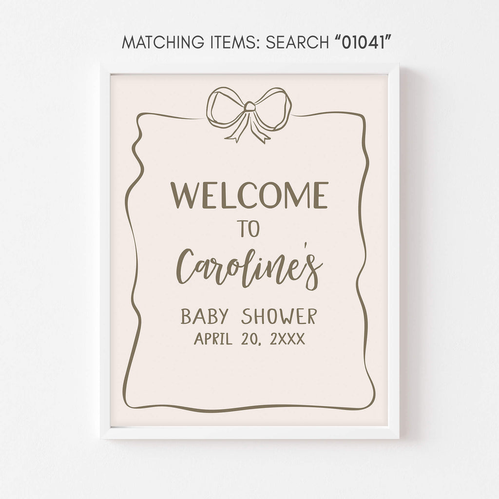 Baby shower welcome sign with bow design on a white background