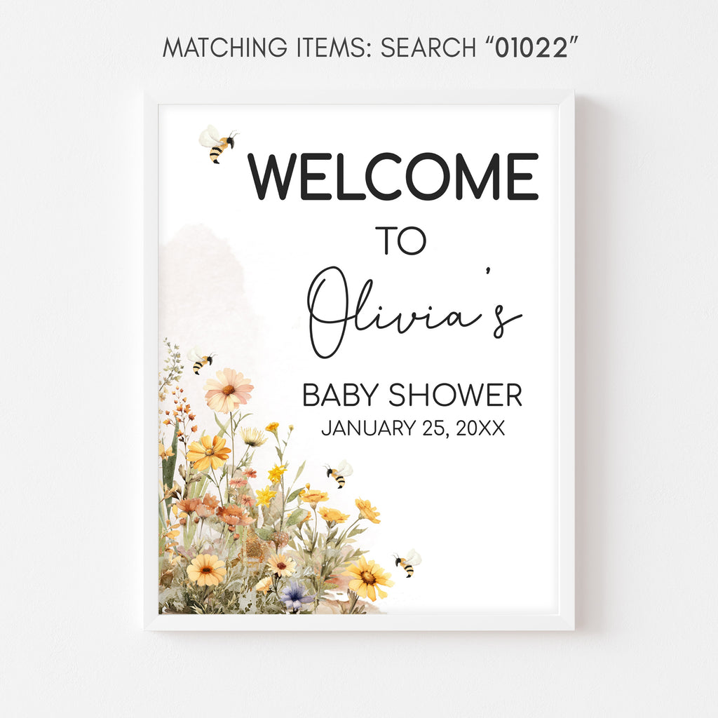 Baby shower welcome sign with floral design and text on a white background