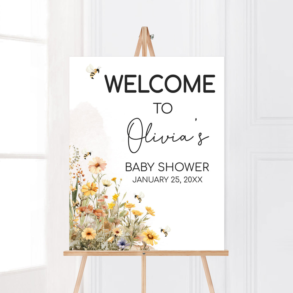 Spring bee baby shower welcome sign featuring wildflower theme for gender neutral event entrance