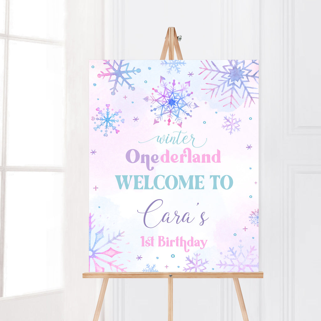 Winter Onederland welcome sign with pink and purple snowflakes