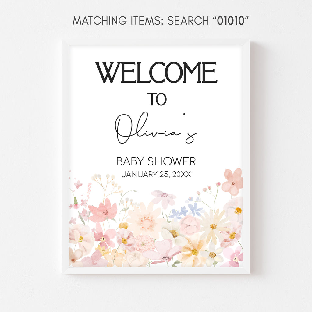 Baby shower welcome sign with floral design and text on a white background