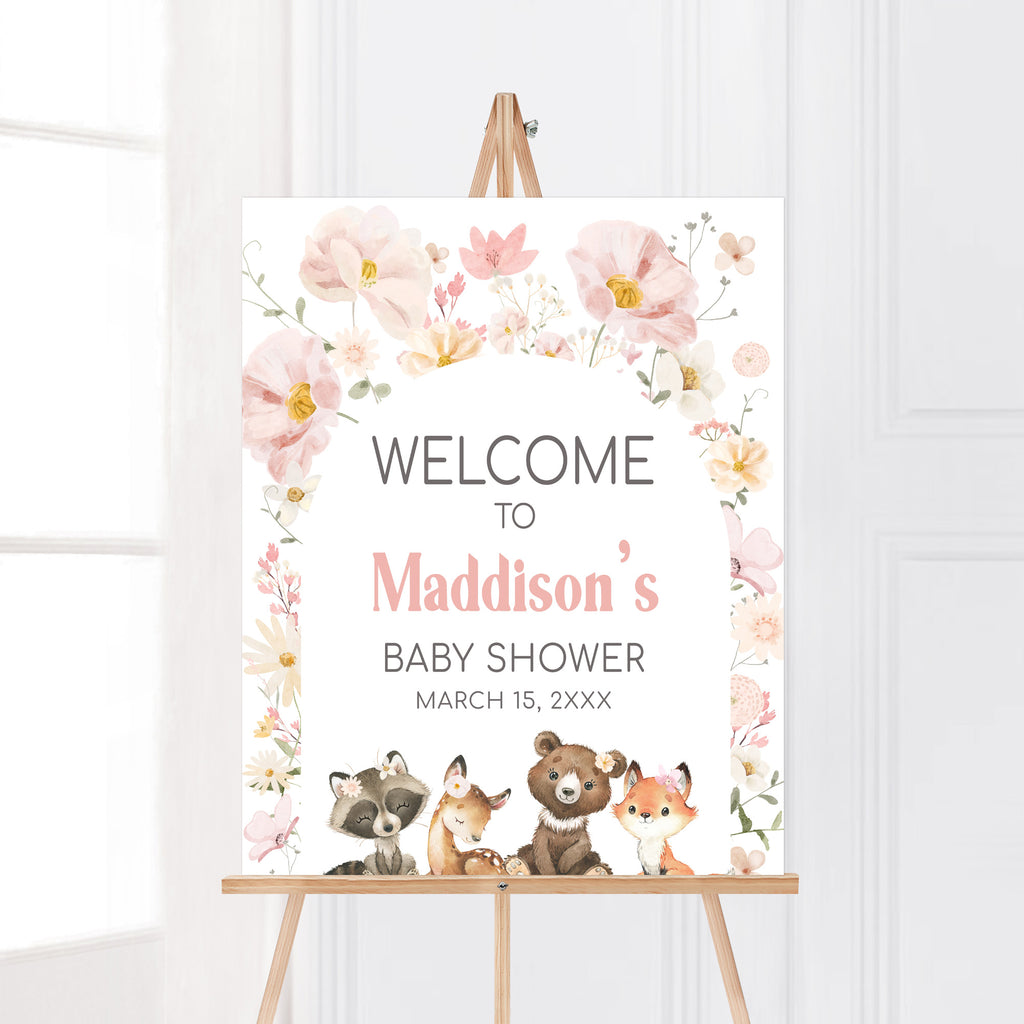Spring woodland baby shower welcome sign with floral and forest animal design for girl celebration