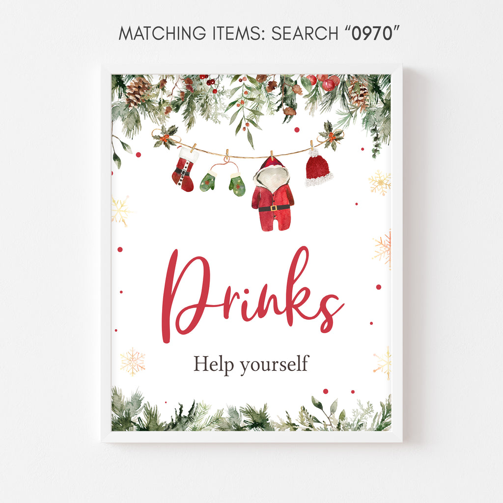 Holiday baby shower drinks sign with Santa baby theme, perfect for festive Christmas celebration